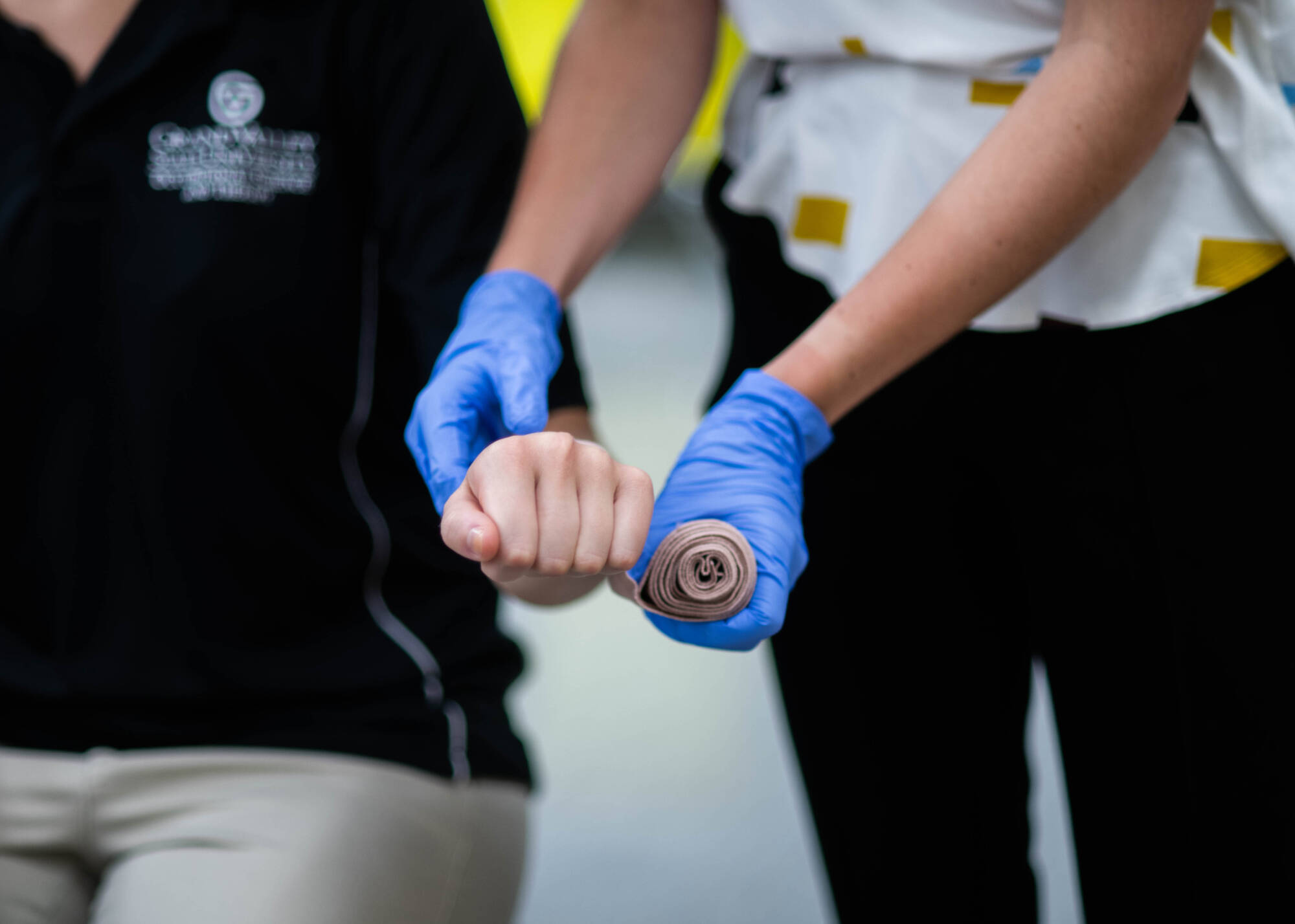 person wrapping hand